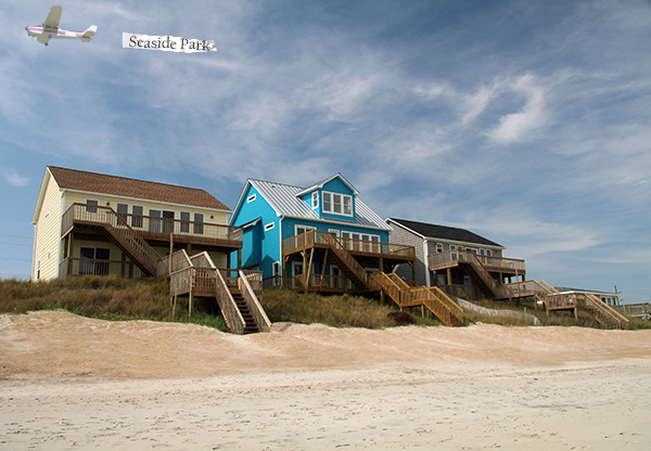 Seaside Park rentals may be on the beach like these three that all have stairs leading right onto the beach. The homes are yellow, turquise blue, and grey from left to right